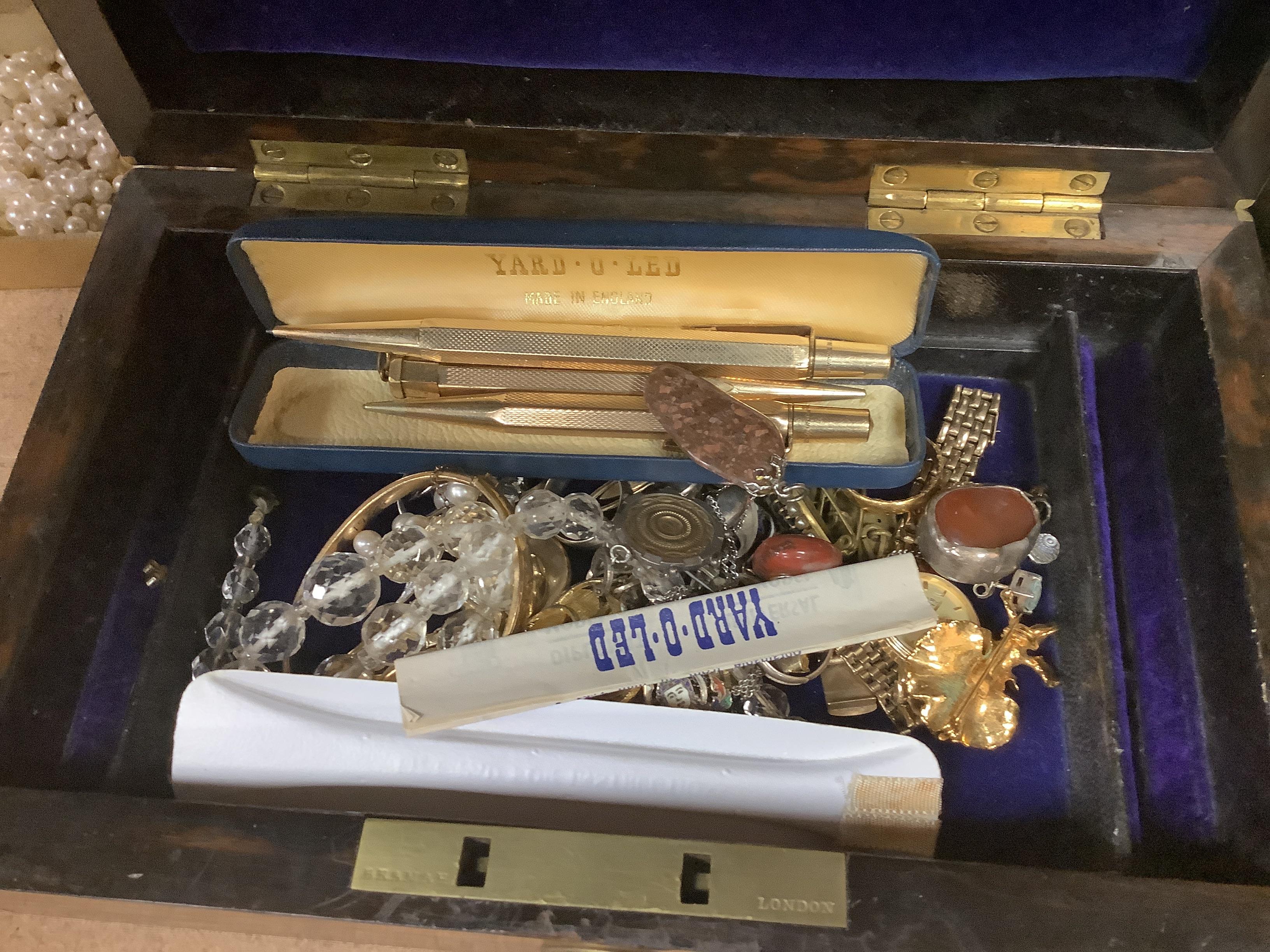 Sundry minor jewellery including a 22ct gold band, a 9ct gold and amethyst ring, a 9ct gold Rotary watch etc. in a brass mounted rosewood box.